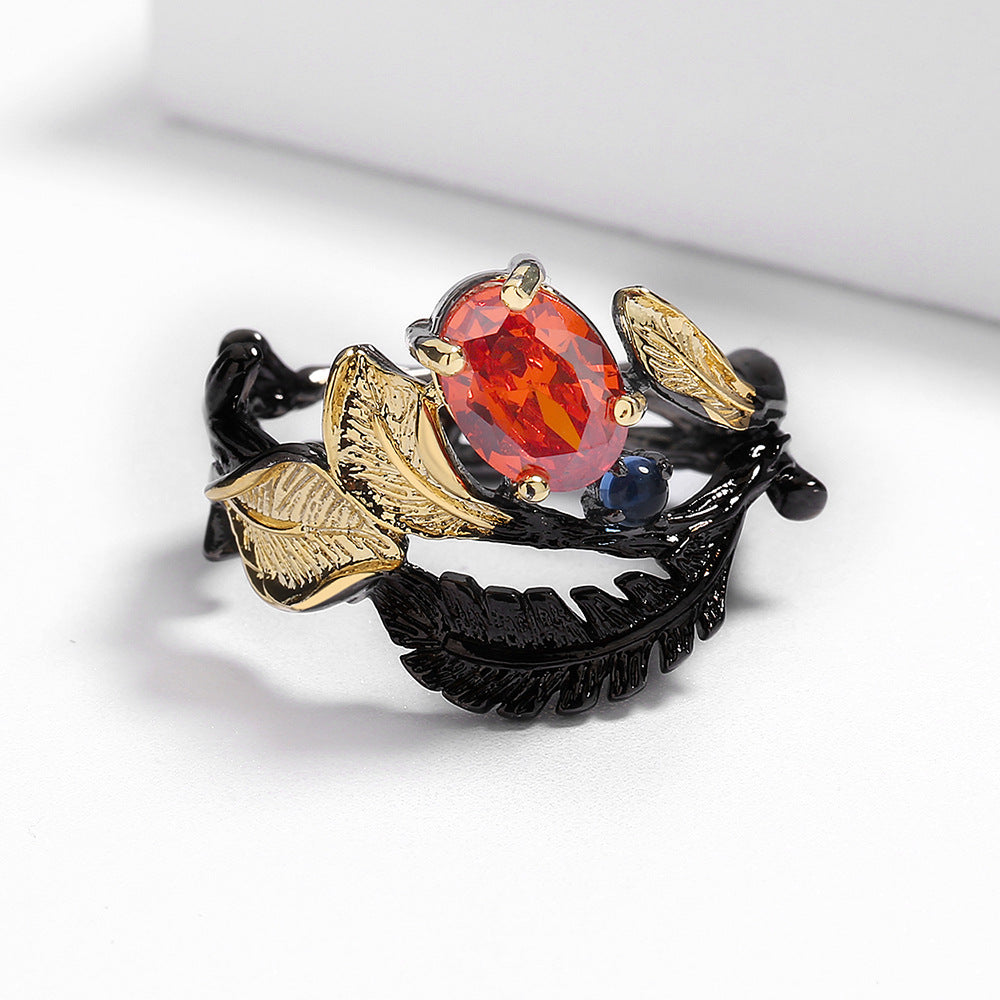 Felistly Jewelry: Exquisite Black Gold Jewelry - Black Feather Ring with Red Zircon, Gothic Party Jewelry for Women