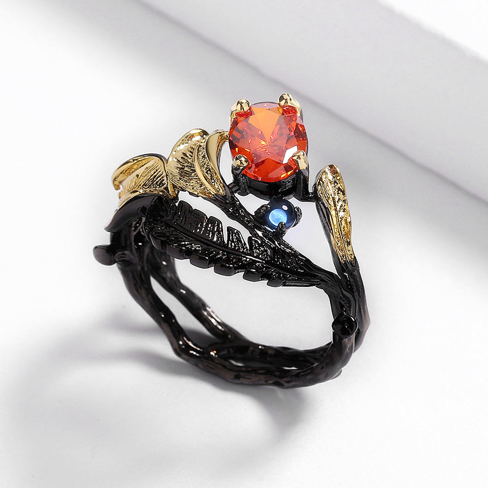 Felistly Jewelry: Exquisite Black Gold Jewelry - Black Feather Ring with Red Zircon, Gothic Party Jewelry for Women